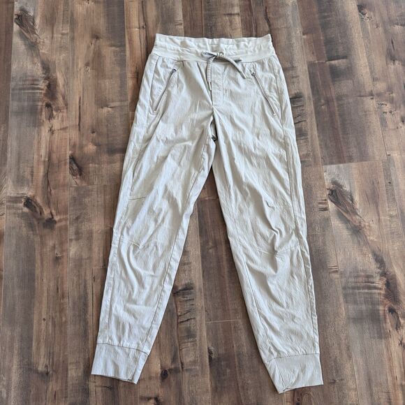 Athleta Trekkie North Jogger Pants Women’s Size 0 Khaki Tan Zip Pockets - Picture 1 of 9